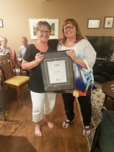 Nita Neufield receiving the Royal LePage Lifetime Award of Excellence and Director's Platinum Awards for sales in 2017